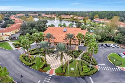 an aerial view of a resort with a parking lot at Flash 20 Off Amazing Pvt Pool Townhome in Kissimmee
