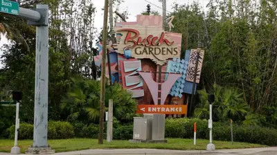a large sign for a building with graffiti on it at Flash 20 Off Private Spa Townhome at Regal Oaks Resort in Orlando