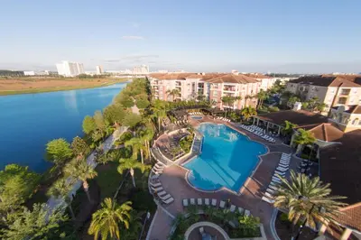 an aerial view of a resort with a swimming pool at New Modern Vista Cay Reserve Condo - 6007 in Orlando