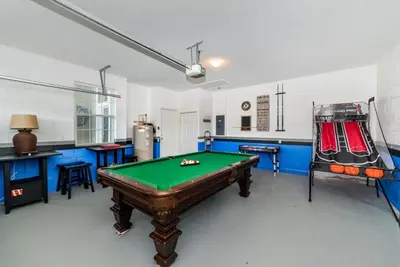 a billiard room with a pool table in it at Special Offer Beautiful Pvt Pool home in Kissimmee
