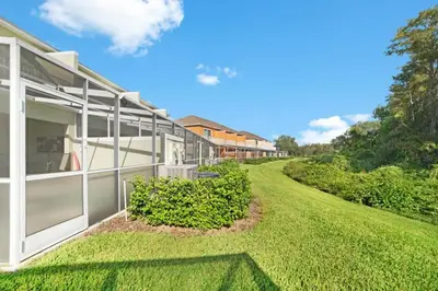an exterior view of a house with a yard at Special Offer Luxury Retreat with Pool in Orlando