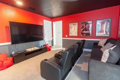 a living room with a couch and a flat screen tv at Special Offer Pvt Pool and Spa Home at Encore in Orlando