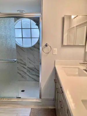 a bathroom with a shower and a sink at Dream Superior 3BR Condo Near Disney Parks in Kissimmee