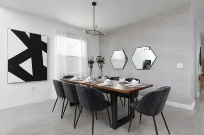a dining room with a wooden table and chairs at Casa 5Q/5B c/ Piscina Perto da Disney in Kissimmee