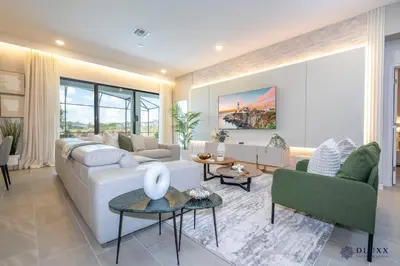 a living room with a white couch and chairs at Brand New DLuxx Top Elegance Vacation Home 1018 in Orlando