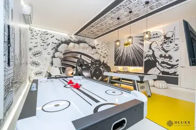 a room with a table and two ping pong tables at Brand New DLuxx Top Elegance Vacation Home 1018 in Orlando