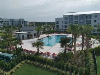 an aerial view of the pool at the resort at Aqua Vista Gated Resort Style Community in Kissimmee
