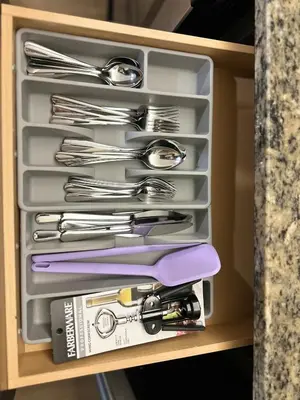 a drawer full of utensils in a drawer at Orlando Bliss Near Disney in Orlando