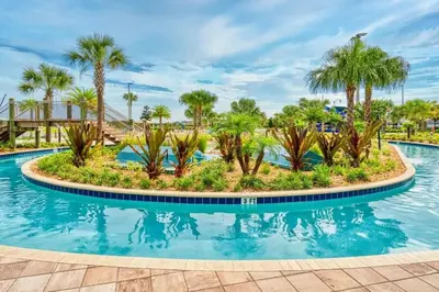 a pool at a resort with palm trees at Casa 4Q com Piscina Aquecível — Storey Lake in Kissimmee