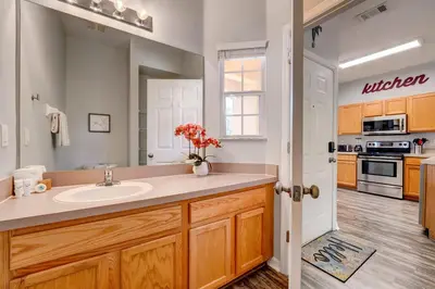 a kitchen with a sink and a stove at Family Retreat Near Disney in Emerald Island in Kissimmee