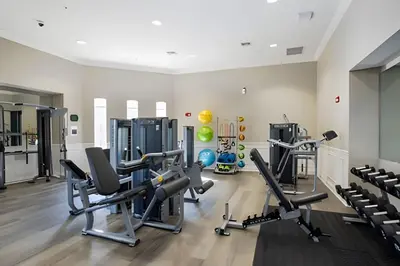 a gym with cardio equipment and treadmills at Vista Cay Spacious Convention Center/Disney in Orlando