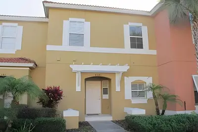 a house with orange and yellow at Encantada Resort, Pool, close to Disney in Kissimmee