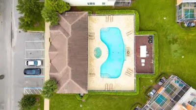 an overhead view of a swimming pool in a yard at Spacious 3BR with Clubhouses and Splash Fun in Orlando