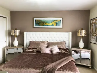 a bedroom with a large bed with two night stands at Windsor Hills Resort - Disney Dream Palace in Orlando
