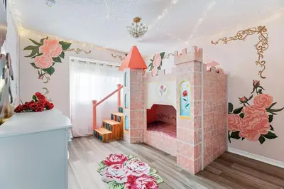 a childs room with a pink castle on the wall at Fantastic 5BR Themed Pool Home Near Disney World in Kissimmee