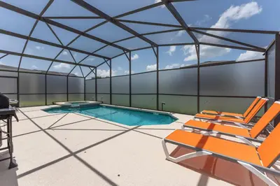 an image of a swimming pool in a tent at Fantastic 5BR Themed Pool Home Near Disney World in Kissimmee