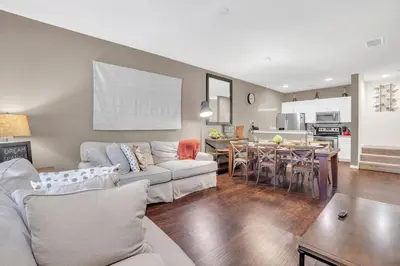 a living room with a couch and a table at Your Disney Vacation Home WL8932 in Kissimmee