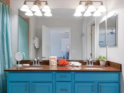 a bathroom with two sinks and a large mirror at Adorable Townhouse Completely Remodeled,3002Pp in Kissimmee