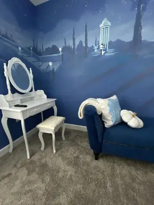 a blue bathroom with a sink and a blue couch at Beautiful Brand New Waterfront Retreat!1689St in Kissimmee