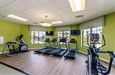 a gym with treadmills and elliptical machines at Modern Decor, Waterview With Splashpool, Bbq 1636Str in Kissimmee