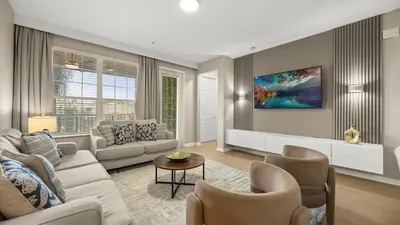 a living room with a couch and chairs at Upstay Spacious 3BR Home w Patio Vista Cay Resort in Orlando