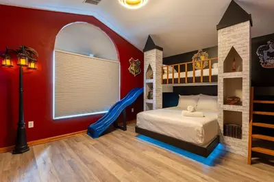 a kids room with a bed and a swing at *Sun Palm Paradise* | Sleeps 14 | Near Disney! in Kissimmee