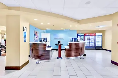 a lobby at a hospital with reception desks at Chic Apartment near Disney w Pool Hot Tub Arcade in Orlando