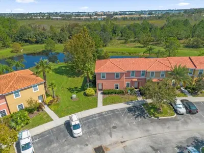 an aerial view of a house with a parking lot at 3 Bedrooms 2 Bathrooms Encantada 3070 Wo in Kissimmee