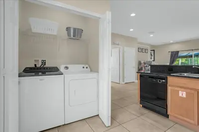 a kitchen with a stove and a dishwasher at 3 Bedrooms 2 Bathrooms Encantada 3070 Wo in Kissimmee