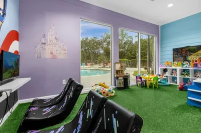 a childs play room with a castle on the wall at Outstanding 4 bdr near Disney 16108 in Kissimmee