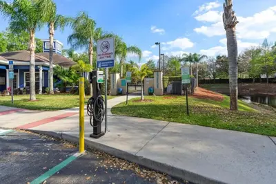 a parking meter with a no parking sign on a street at Outstanding 4 bdr near Disney 16108 in Kissimmee