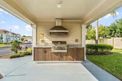 a kitchen in a house with a stove at 3BR Disney Escape for Families in Kissimmee