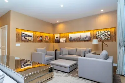 a living room with two couches and a table at Luxury 3BDR House near Disney 7527 in Orlando