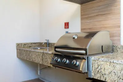 a kitchen with a stainless steel appliance on a counter at Luxury 3BDR House near Disney 7527 in Orlando
