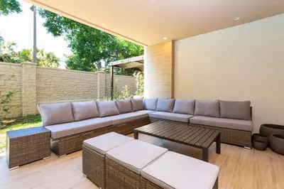 a patio with a couch and a table at Luxury 3BDR House near Disney 7527 in Orlando
