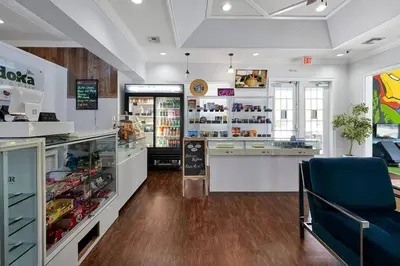 a grocery store with a counter and a blue chair at Perfect vacation spot near Disney 7105 in Kissimmee