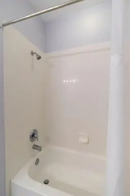 a white bathroom with a tub and a sink at Home Away from Home in Disney 4106 in Kissimmee