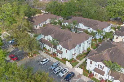 an overhead view of a house with cars parked in a parking lot at Home Away from Home in Disney 4106 in Kissimmee