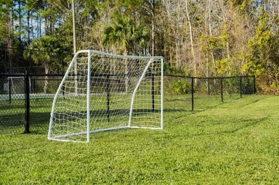 a soccer goal in the middle of a field at Luxury and Cozy Gem 15min to Disney Free Parking in Kissimmee