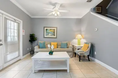 a living room with a couch and a ceiling fan at Perfect Gateway to Disney 9108 in Kissimmee