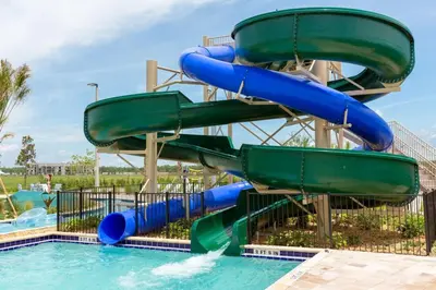 a water slide at a water park at Amazing 4BDR with pool near Disney - 4914 in Kissimmee