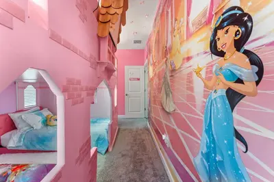 a room with a disney princess mural in a pink room at 2817 Storey Lake Kissimmee in Kissimmee