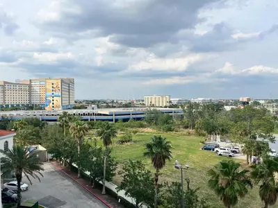 a view of a city with palm trees and buildings at Universal-Disney Dream 606S - 1 Bedroom in Orlando