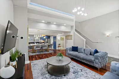 a living room with a couch and a table at 14531 Damai in Orlando