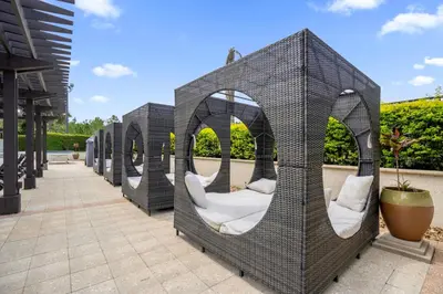 a group of gazebos with white pillows at 14531 Damai in Orlando