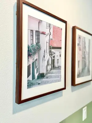 two framed photographs hanging on a wall at Boho retreat close to Disney! in Kissimmee