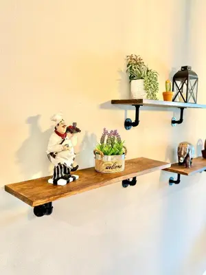 a shelf with a figurine sitting on top of it at Boho retreat close to Disney! in Kissimmee