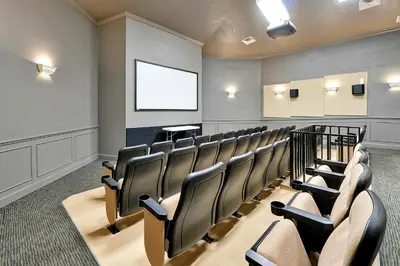 a lecture room with chairs and a screen at Spring Break Awaits Disney Close Pool Slides Fun in Orlando