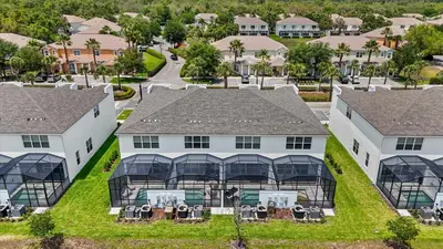 an aerial view of a house with glass roofs at Upstay-Luxury 3BR Home w Private Pool & Games Room in Orlando