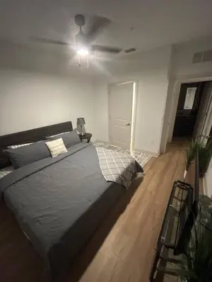 a bedroom with a bed and a ceiling at Kissimmee Oasis in Orlando